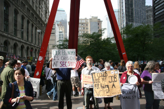 Illustration for article titled "Radiohead Wouldn't Play In The Big East Either": Occupy Wall Street Has An "Occupy Herbstreit" Photobomber